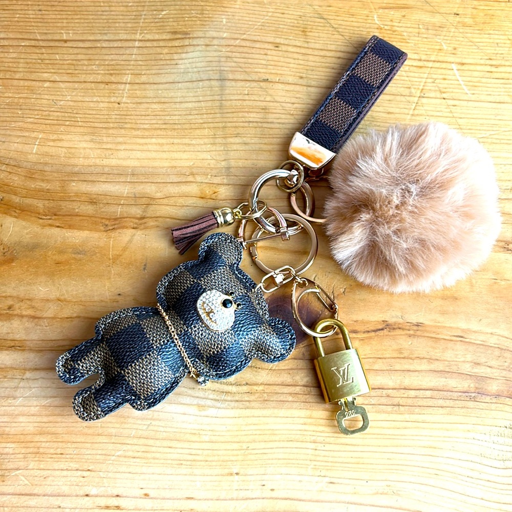 Louis Vuitton Lock and Key with a unbranded Teddy Bear Keychain